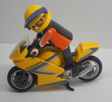 Biker mit Motorrad  Motorsport